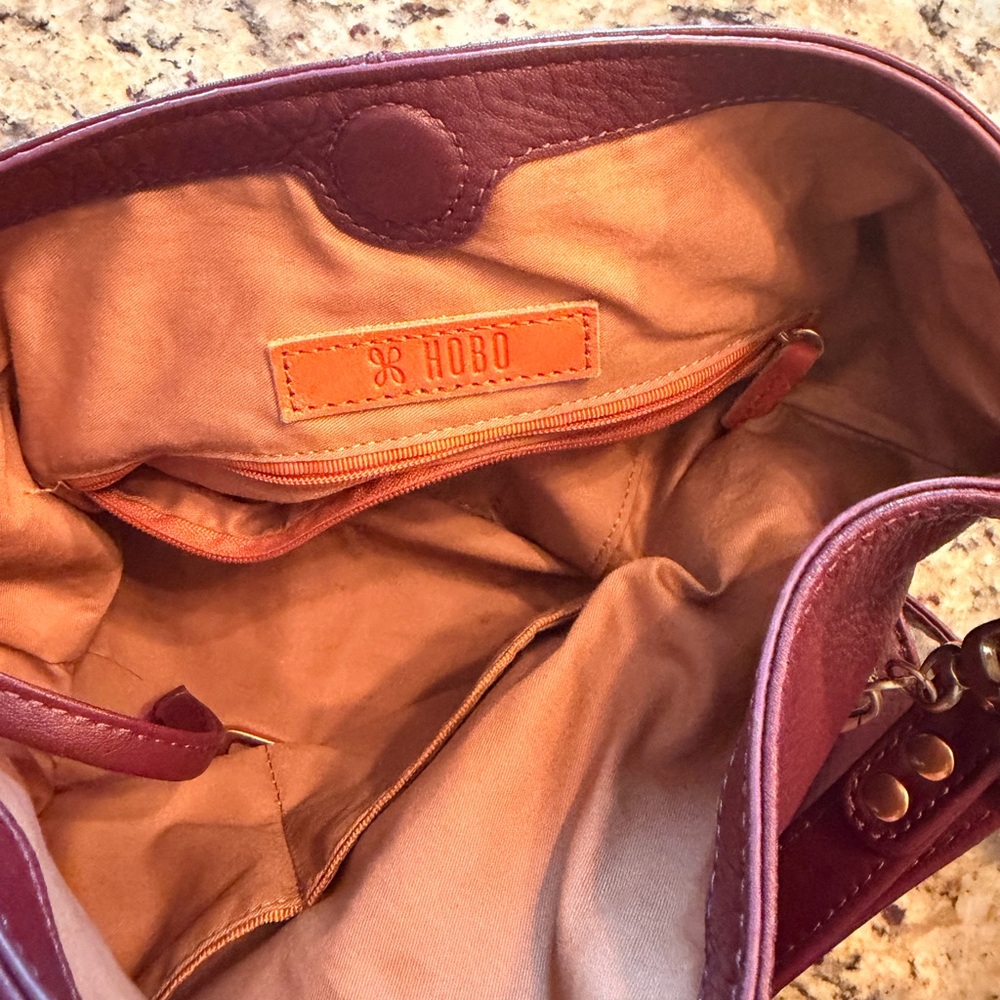 HOBO Burgundy Leather Shoulder Bag with Black Tassel and Gold Hardware - Picture 9 of 9